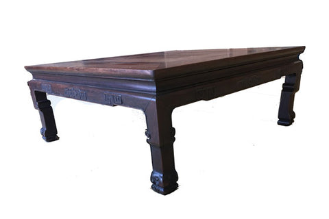 Square carved tea table in rich dark brown wood